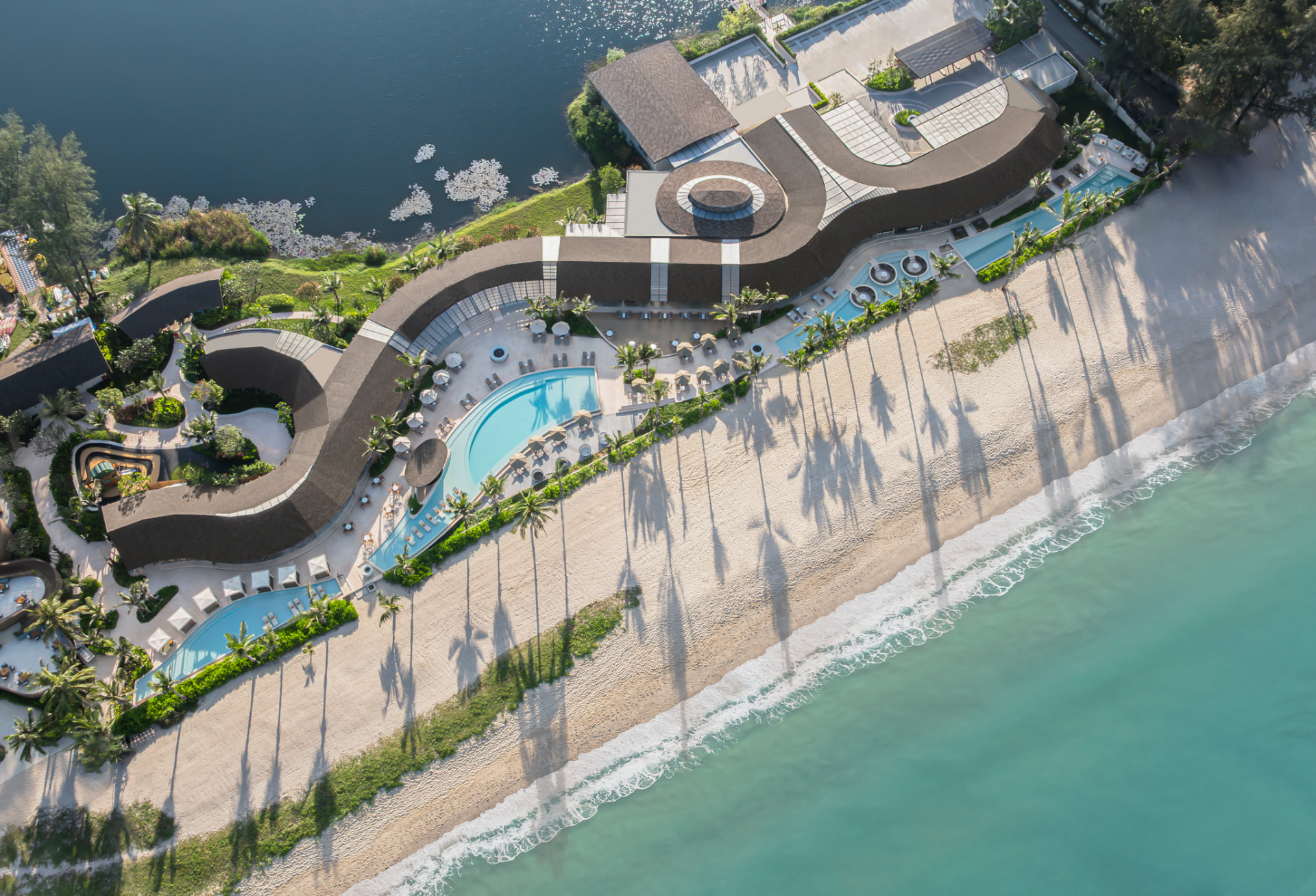 Aerial view of RAVA Beach Club and Banyan Tree Phuket on the Andaman coast